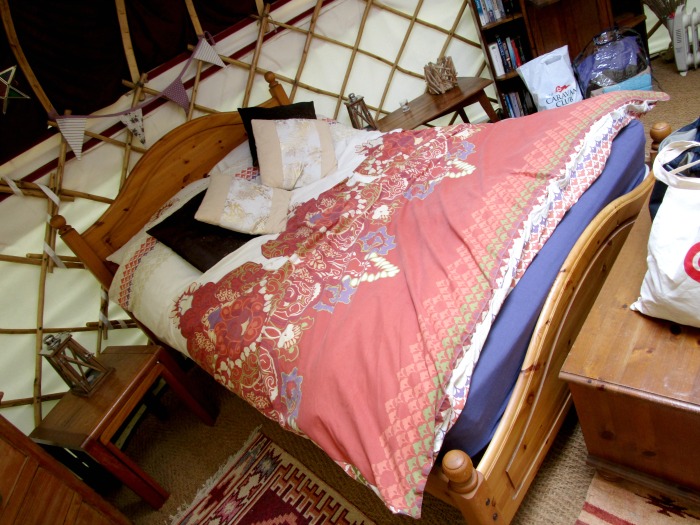 double bed in the yurt