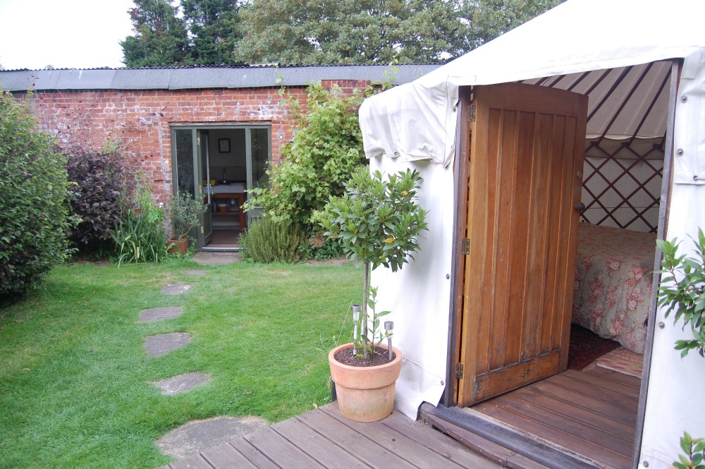 Short Essex Family Break Woodpecker Yurt shower block and kitchen